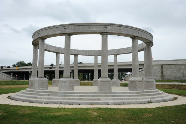 The Confederate memorial at Orange's Martin Luther King Drive and Interstate 10, is scheduled to have 32 Confederate flags erected upon the structure's completion. The flags will be installed in increments of eight. Photo taken Monday, April 03, 2015 Guiseppe Barranco/The Enterprise Photo: Guiseppe Barranco, Photo Editor