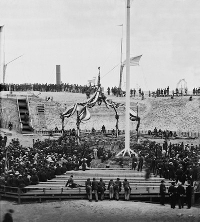 This photograph shows the crowd inside Fort Sumter on April 14, 1865, moments before the United States flag was raised there, symbolically marking the Civil War’s end. Library of Congress