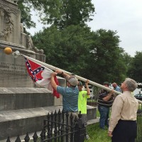The Confederate Flag is removed from the capitol grounds in Montgomery.