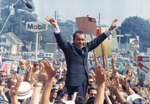 Since the 1980s, the Republican Party has doubled down on the Southern Strategy advanced by Richard Nixon—running against civil rights and black gains. Here, Nixon gives his trademark "victory" sign while in campaigning in Philadelphia in 1968.