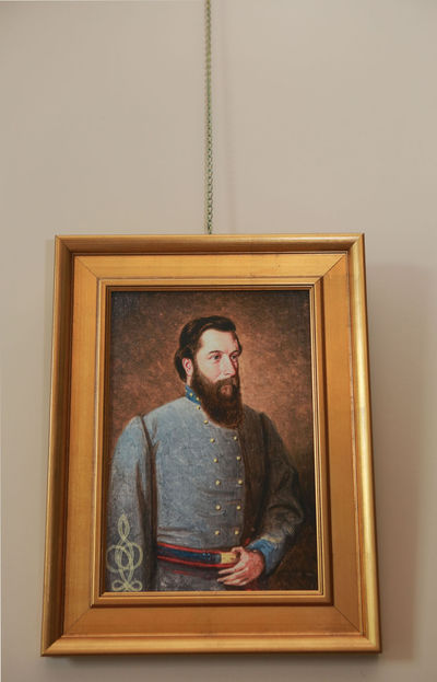 portrait of Gen. Gabriel Wharton hangs in the home he built with his wife, Nannie Radford Wharton. It is unusual to find so many letters written by a woman during the Civil War, William C. “Jack” Davis said. Because they were carried by soldiers, they were often lost or damaged. But Wharton mailed his wife’s letters back to her, and she sewed the correspondence into books arranged in chronological order. They were stored in the Glencoe Mansion attic for more than a century, then moved to a garage in Florida for many years before Wharton descendant Sue Bell found them. MATT GENTRY | The Roanoke Times